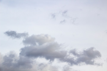 Amazing clouds in the sky. A beautiful clouds against the white sky background. Amazing cloud pattern in the sky can be used in design concept
