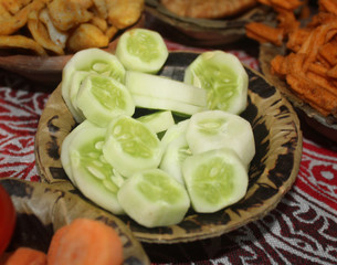 cucumber salad served in disposable plate