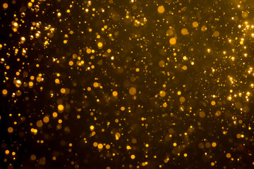 Golden blur glitter  lights abstract bokeh for Merry Christmas and New Year