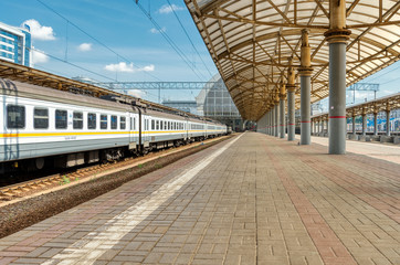 Fototapeta na wymiar Empty, uninhabited platform of the railway station.