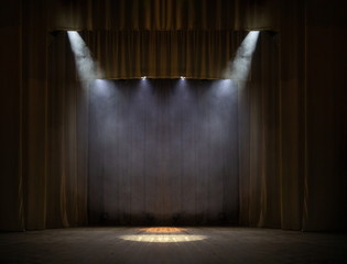 Theater stage with puffs of smoke, illuminated by stage light.