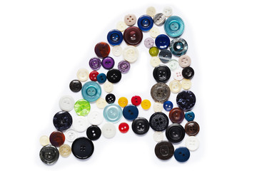 Letter A design made from clothing elements.