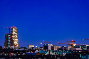 Naklejka premium Stockholm, Sweden The newly built Norra Tornen building at dawn contrasting with its surroundings.