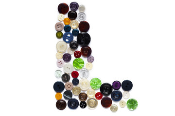 Letter L design made from clothing elements.