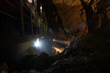 Abkhazia, underground caves of New Athos. Stalactites and stalagmites. - obrazy, fototapety, plakaty