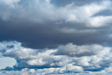 Cumulus clouds in a blue sky