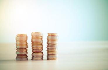 Money concept: Coins tacked on each other. Inflation, currency, savings, money