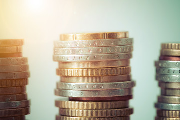 Money concept: Coins tacked on each other. Inflation, currency, savings, money