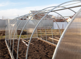 Installation of a greenhouse in the garden.