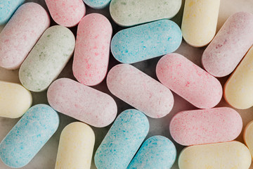 Pastel pills macro shot background