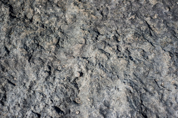 Grey textured stone background in breakwater at Morecambe