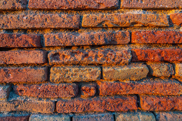 Fragment of an old brick wall in Spain
