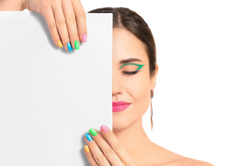 Young woman with beautiful manicure and blank poster on white background