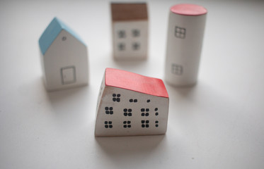 small wooden houses. Stay at home during coronavirus. Homeless need home. Buy house.	