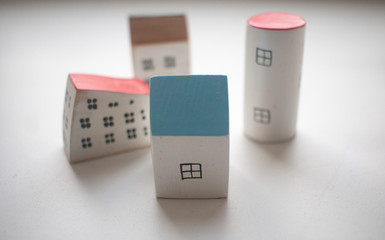 small wooden houses. Stay at home during coronavirus. Homeless need home. Buy house.	