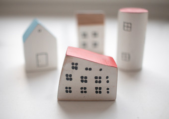 small wooden houses. Stay at home during coronavirus. Homeless need home. Buy house.	