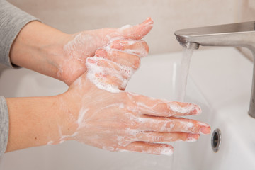 Fototapeta premium instructions for proper hand washing for disinfection and protection against bacteria and the virus.