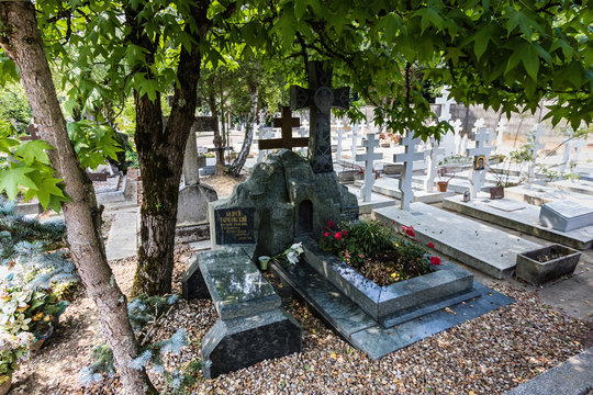 A grave tomb of the famous Russian film director, Andrei Tarkovsky, at the Sainte-Genevieve-des-Bois Russian Cemetery, France