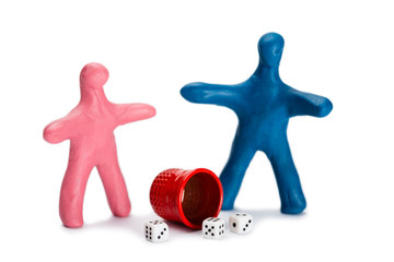 Plasticine small people play dice