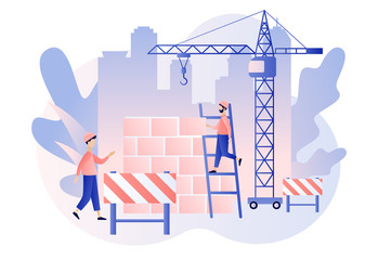 Build and Home Repair concept. Modern building process. Tiny men builders and repairers working with professional tools. Modern flat cartoon style. Vector illustration on white background