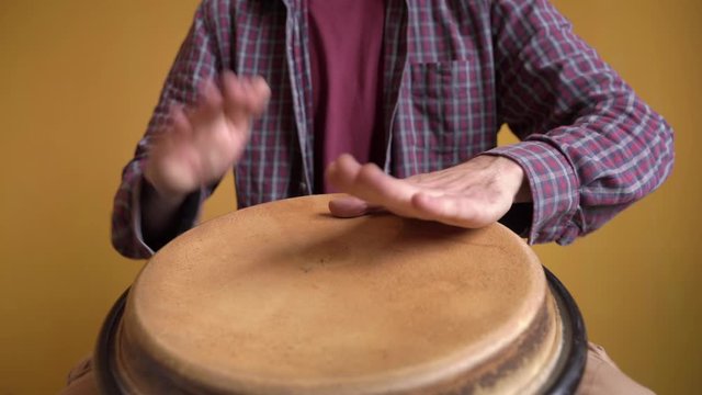 Conga Latin Drums. Hands of musician playing Conga Drums, traditional afro-cuban percussion instrument