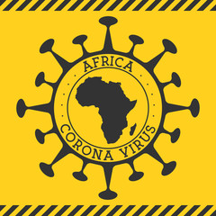 Corona virus in Africa sign. Round badge with shape of virus and Africa map. Yellow continent epidemic lockdown stamp. Vector illustration.