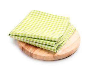 Clean napkins with cutting board on white background