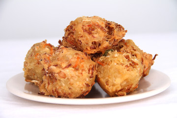 Traditional Indonesian Vegetable Fritters Snack called “Bakwan” or “Gorengan”