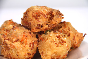 Traditional Indonesian Vegetable Fritters Snack called “Bakwan” or “Gorengan”