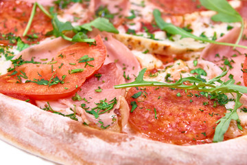 Pizza with pepperoni and rucola isolated on white background