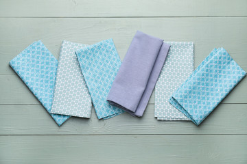 Clean napkins on wooden background