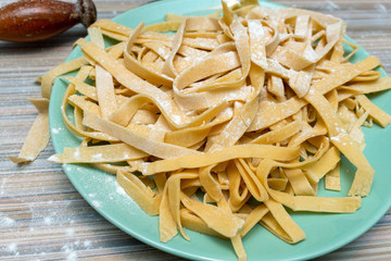 Homemade pasta preparation process with rolling pin