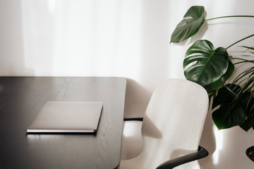 Laptop on a black table