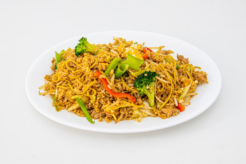 noodle tray with sauteed vegetables
