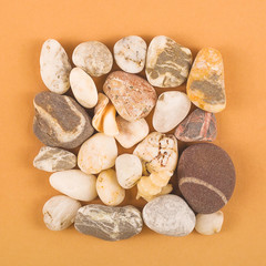 Sea stones on a calm natural background. Meditation and wabi sabi style flat lay.