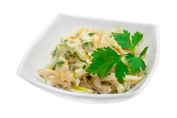 Tasty salad of green apple and boiled squid on a white background. Isolated object