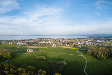 Fototapeta na wymiar Romanshorn and the lake of Constance from high above the forrest