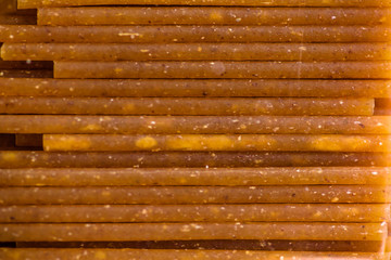 raw durum spaghetti background close up shot