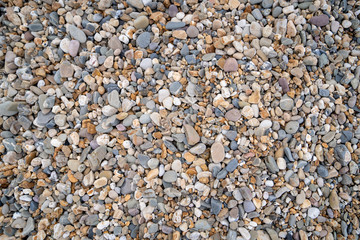 A close up of a rock and pebbles
