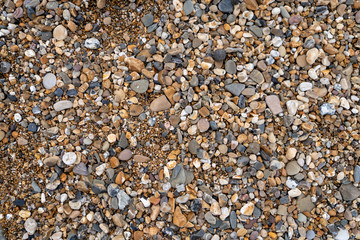 A close up of a rock and pebbles