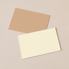 Business cards on beige background mockup