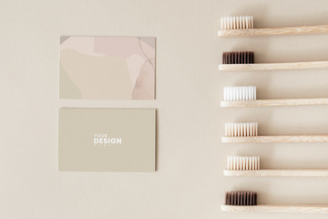 Bamboo toothbrushes and design card mockup