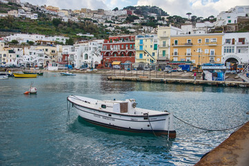 Fototapeta na wymiar boats for tourists in the Marina Grande harbor, Capri, Italy