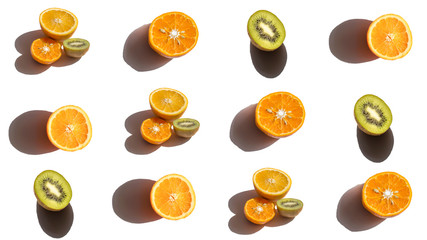 Pattern with oranges and kiwis on a white background. The basis for the design with tropical fruits