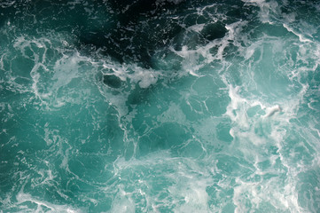 Aerial view to ocean waves.