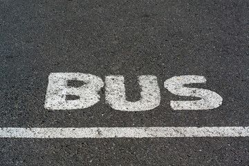 bus word on tarmac