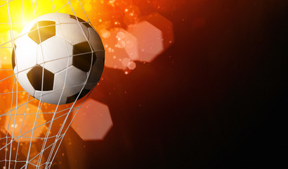 soccer ball in goal with spotlight
