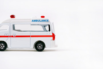 Tiny Ambulance toy car on white background                                                                                                 