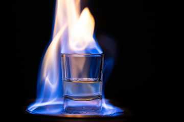  Burning alcohol on black
