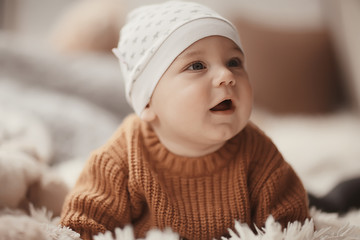 kid in a warm sweater child boy / portrait seasonal clothes, warm knitted sweater on a child, autumn portrait